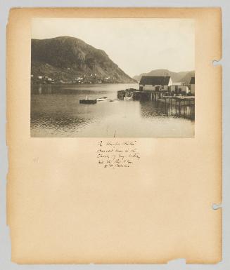 In Harbor Breton, Boarded here in the Church of Eng. Rectory with the Rev. [illeg.] R.V. Mercer. Page 43 of Newfoundland from Collection of Canadian albums compiled by Edith S. Watson
