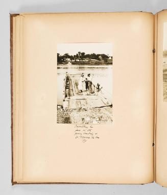 Collecting his fare on the ferry landing at St. Francois du Lac, Que. Page 28 of The Abenaki; from collection of Canadian albums compiled by Edith S. Watson, 1890s-1930s