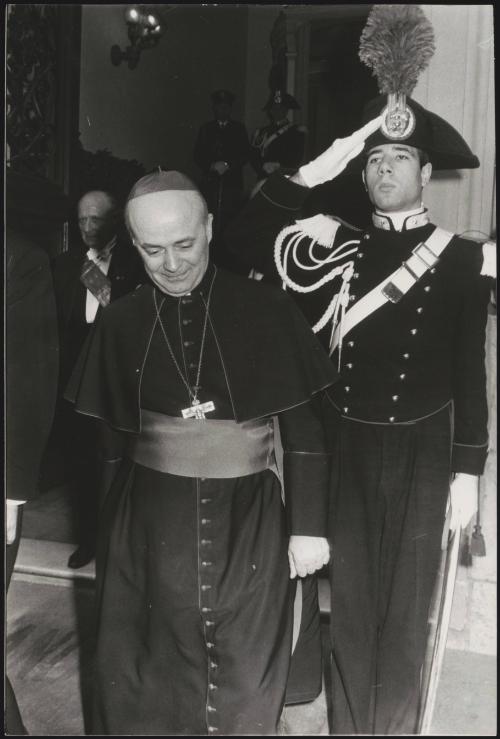 Cardinal Giovanni Benelli leaving St. Peter's Basilica, flanked by ceremonial guard