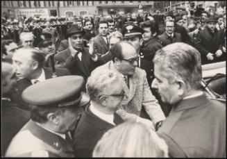 Giovanni Leone is ushered into a car amongst a huge crowd