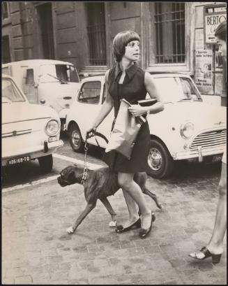 Actress Anna Maria Ferrero walks her dog 