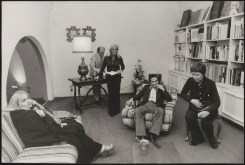 Laura Betti, Pier Paolo Pasolini and Serge Gainsbourg in the sitting room of a large house