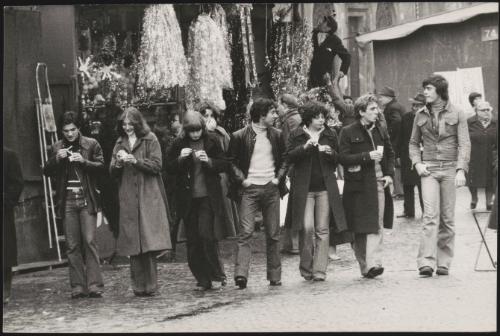 Street scene with young people eating gelati