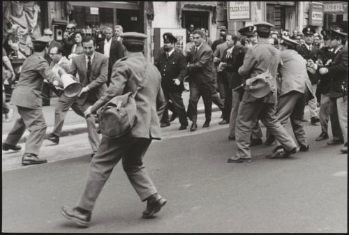 Clashes in the street between police and protesters during a protest