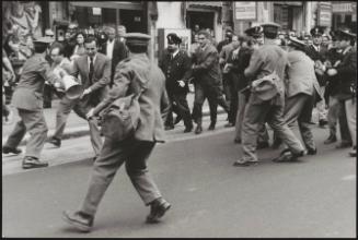 Clashes in the street between police and protesters during a protest