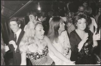Pier Torri, Odile Rodin, Elsa Martinelli and Régine dancing at a night at the 'Number One' club in Rome