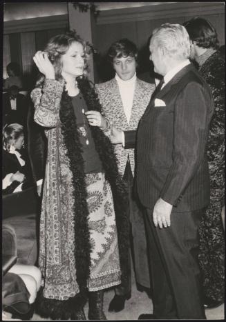 Vittorio De Sica, Lino Capolicchio, Dominique Varaigne at a party