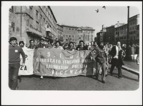 Italian police workers union unit march in demonstration
