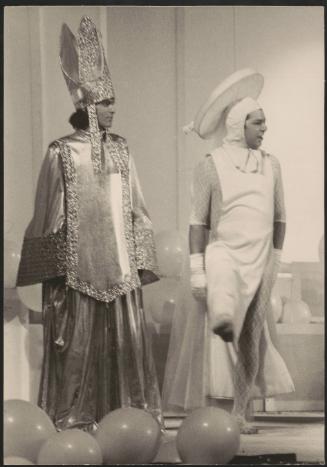 Two men in theatrical costumes 