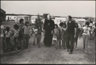 Catholic bishops Monsignor Emanunele Clarizio and Don Carlo (Antonio) Riboldi visiting a Roma caravan site 