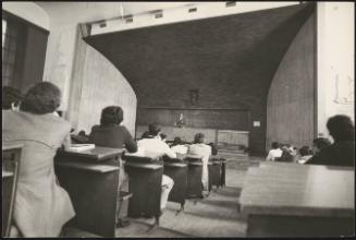 Students sitting in a lecture hall at the university of Rome