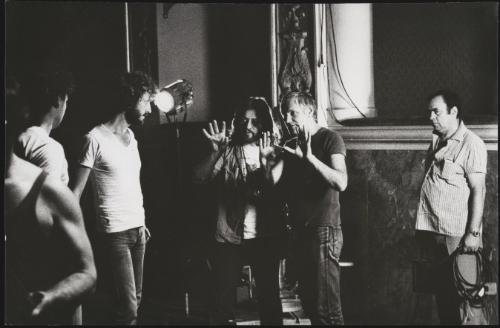 Portrait of Hungarian director Miklós Jancsó at work on set