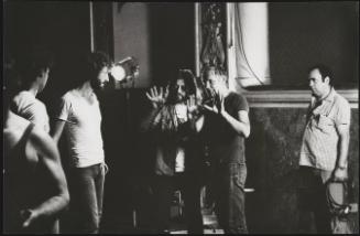 Portrait of Hungarian director Miklós Jancsó at work on set