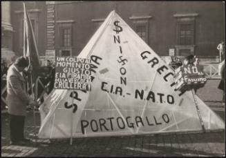During an anti-fascist demonstration, a 'pyramid of shame' banner with various protest and anti-Nixon slogans written on it