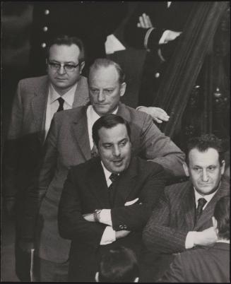 A group of Italian politicians, Riccardo Misasi and Ciriaco De Mita (both Christian Democrat deputies)  at the bottom of the frame with their arms crossed