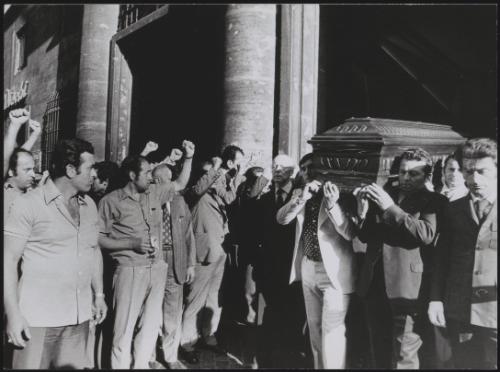 Pallbearers carrying the coffin of Pietro Secchia before a crowd of Italian Communist Party supporters