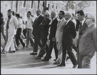 Prominent Communist politicians walk in a sombre line after the funeral of Pietro Secchia, an important member of the Italian Communist Party, who died after a long illness in July 1973. From left, they are Paolo Bufalini, Giancarlo Pajetta, Armando Cossutta, Umberto Terracini, Enrico Berlinguer and Emilio Sereni