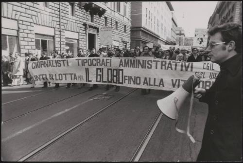 Journalists and typographers march at a demonstration to save the newspaper 'Il Globo' 