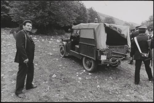 Policemen deal with the aftermath of a gun battle with neo-fascists on L ' Rascino Plateau in which right-wing extremist Giancarlo Esposti was shot dead