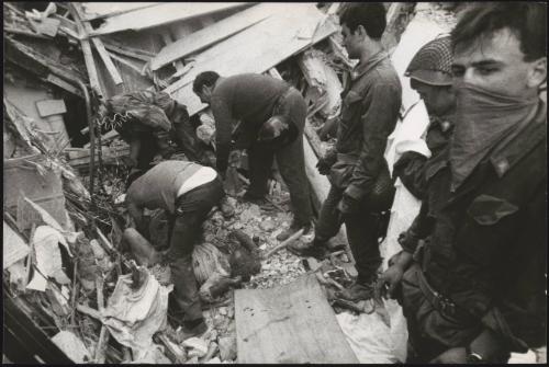 A victim is carried out of the destruction of the Friuli earthquake in the town Osoppo 