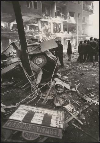 Twisted metal and burnt out cars after an explosion
