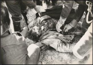 An earthquake victim in Belice, Sicily, is pulled from the rubble to be identified