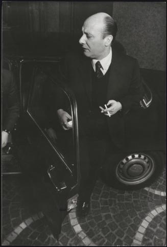 Antonino Gullotti steps out of a car