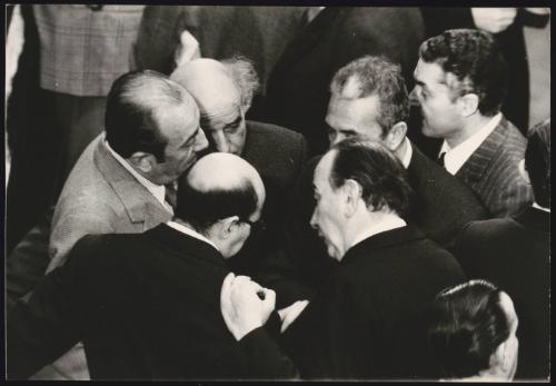 A huddle of politicians including Aldo Moro, Giovanni Galloni and Carlo Donat-Cattin in parliament