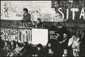 Members of the The Italian Communist Youth Federation (FGCI) speaking at a rally