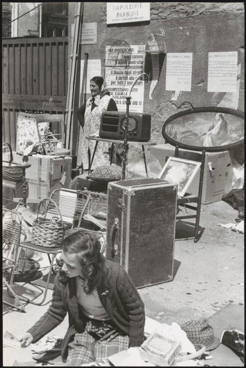 A street market selling household items 
