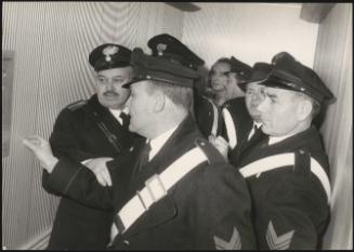 Pietro Valpreda ushered into his trial by police