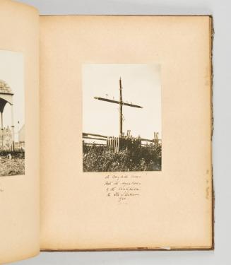 [A wayside cross, with its symbols of the crucifixion. In Ile d'Orleans, Que. [Page 29 of Quebec I; from collection of Canadian albums compiled by Edith S. Watson, 1890s-1930s.]