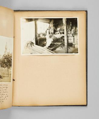 [Jobin in his workshop with a large statue of Christ on the Crucifix] Page 69 of Ste Anne de Beaupré; from collection of Canadian albums compiled by Edith S. Watson, 1890s-1930s