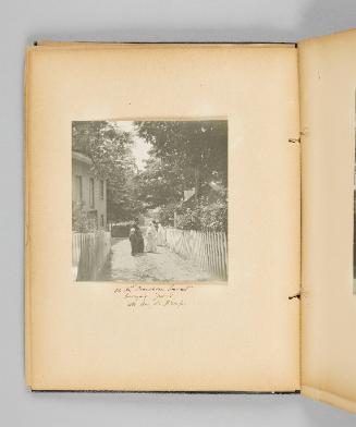 At the Franciscan Covent burying ground, Ste. Anne de Beaupré. Page 20 of Ste Anne de Beaupré; from collection of Canadian albums compiled by Edith S. Watson, 1890s-1930s