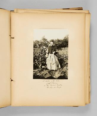 [A Sister of the Order of Ste. Rosaire, in the convent garden, Ste. Anne de Beaupré. Page 19 of Ste Anne de Beaupré; from collection of Canadian albums compiled by Edith S. Watson, 1890s-1930s