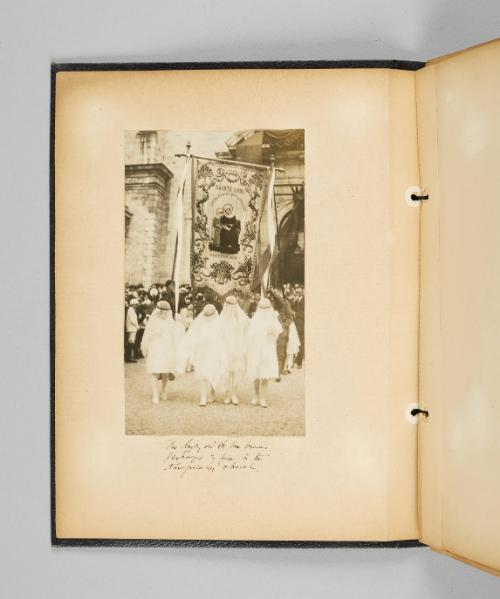 [Ste. Anne banner with procession] Page 2 of Ste Anne de Beaupré; from collection of Canadian albums compiled by Edith S. Watson, 1890s-1930s
