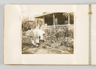 [Woman tending to her garden, page 8 of The Doukhobors I album]