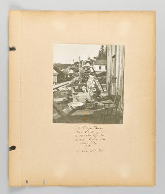 A picturesque Thunder-Bird stands guard on the doorstep of a Siwash Indian Home. Alert Bay B.C. A household God! [Page 13 of Alert Bay, Queen Charlotte Islands, and Victoria, B.C.]