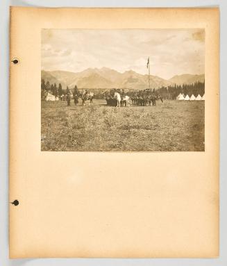 A review of the North West Mounted Police at their summer camp at Banff. [Page 11 of Banff, Lake Louise album]