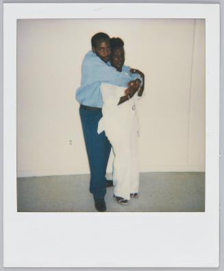 Clo [illeg.] 6-10-00 [illeg.] [Young couple posing, man standing behind woman with his arms wraped around her]