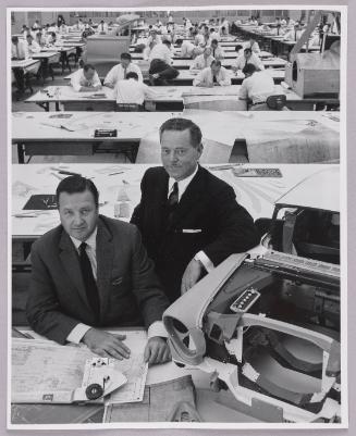 Henry Ford II and Ernest R. Breech in the Body Engineering Building at the Research and Engineering Center, Dearborn, Michigan 
