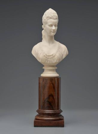 Bust of a Woman wearing a long woven pony tail with ribbon