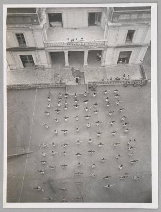 Young girls practice gymnastics on the court of the "Maria de Molinas" social home for girls.