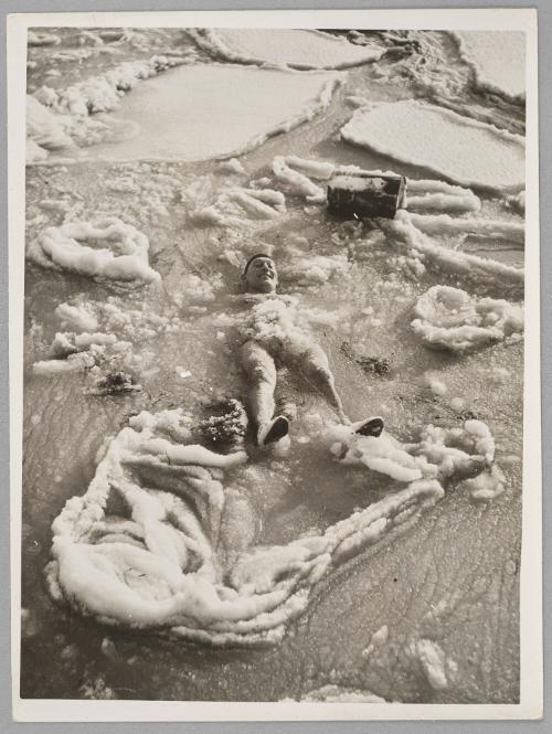 A member of the "Viking Club" enjoying his cold dip amidst the ice floes.