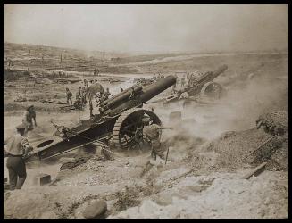 A battery of heavy howitzers pounding the German trenches