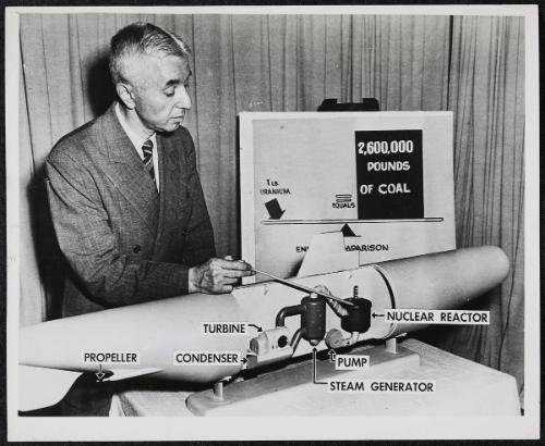 A scientist demonstrates a model of a Nuclear powered submarine and compares the nuclear to coal power