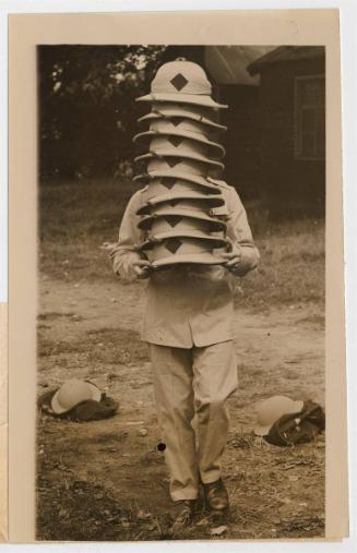 A Rather "Staggering" Style in Hats - Topees for Palestine Troops.