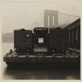 Barge with Railroad Cars under Brooklyn Bridge