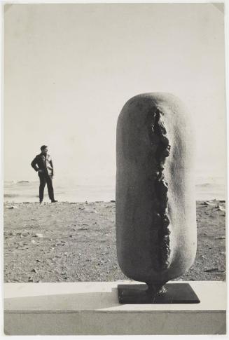 Arthur Handy (on the beach with sculpture)
