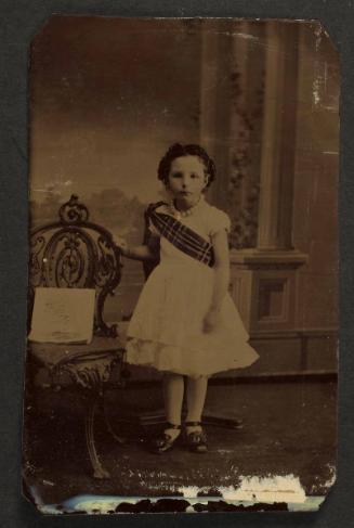 Unknown sitter [portrait of a standing girl with tartan fly plaid]